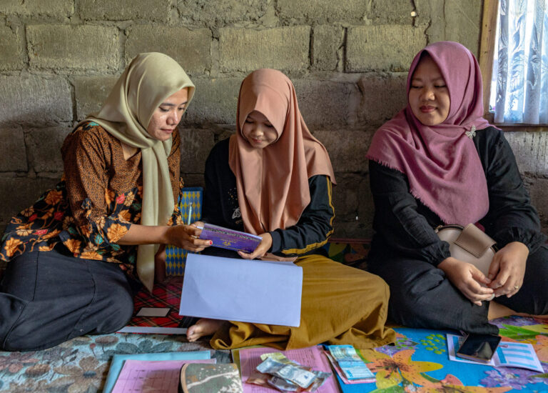 Women's Credit Union members gather in Bengkulu Village.