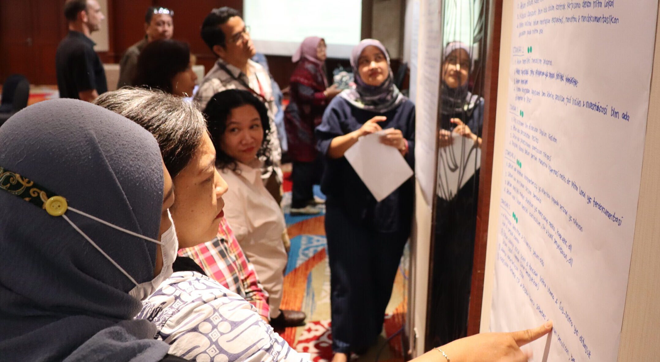 INKLUSI and its partners in a workshop to discuss safeguarding policies.